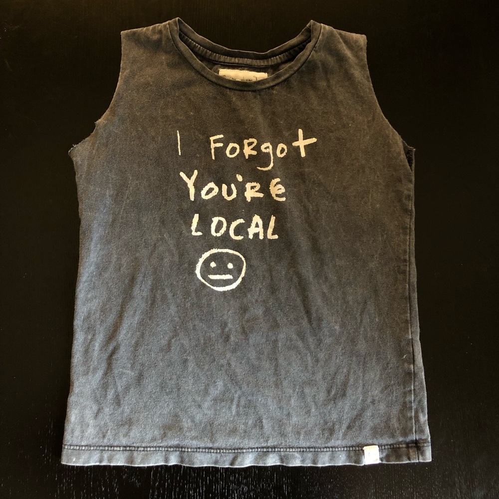 Distressed Children of the Tribe cut-off tee.
